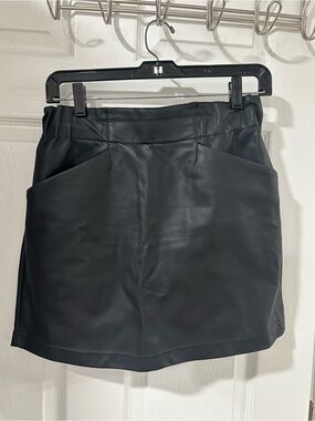 Indigo Rein Black Faux Leather Mini Skirt with Front Pockets